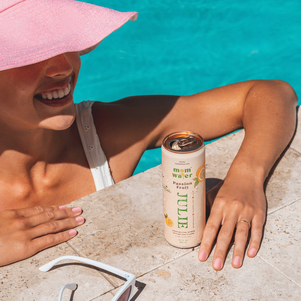 Picture of the Julie can with a woman poolside