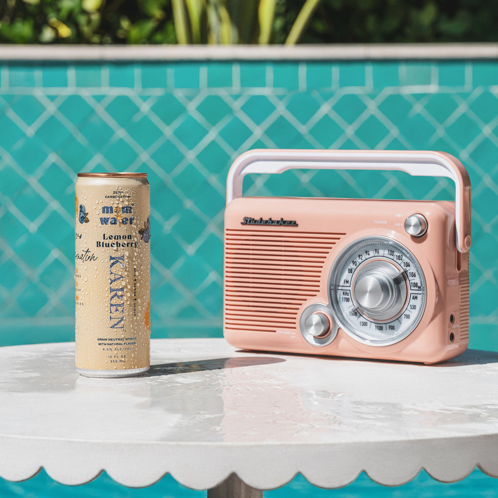 Picture of the Karen can poolside with a radio