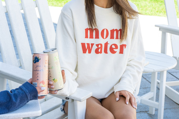 woman wearing mom water sweater